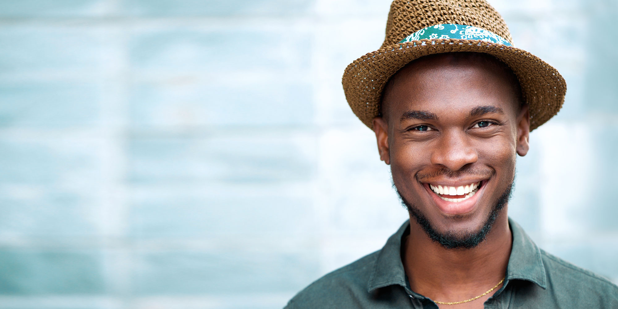 patient smiling after dental procedure Lafayette IN